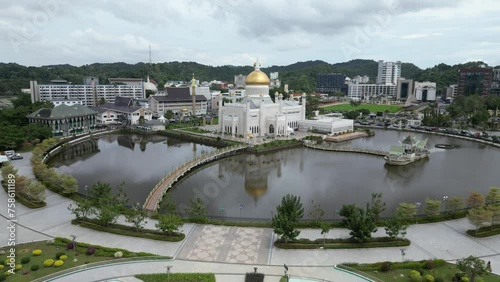 Aerial drone shot of beautiful garden complex in front of the Sultan Omar Ali Saifuddien Mosque in Bandar Seri Bagawan in Brunei Darussalam
 photo