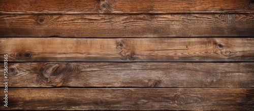 Close up of a brown hardwood plank wall with a brickwork pattern, showcasing the natural beauty of wood flooring and building material