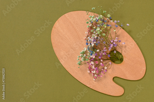 Flower composition green background. Top view of the palette with flowers. The concept of beauty  romance  recognition of feelings. Postcard for Mother s Day Valentine s Day International Women s Day