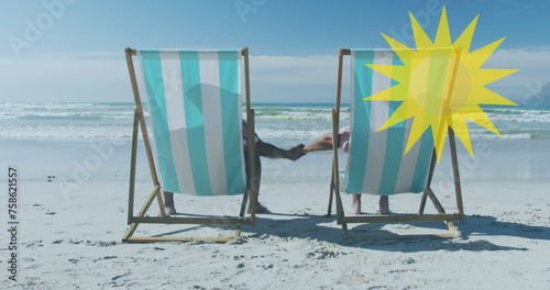 Image of sun over senior african american couple lying on sunbeds on sunny beach
