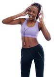 Energy, fitness and music with happy black woman in studio isolated on white background for wellness. Exercise, singing and headphones with confident young sports model streaming radio for training