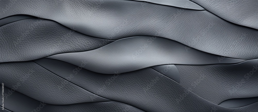 Obraz premium A closeup of a grey metal roof with wave patterns resembling silk. Tints and shades of electric blue create an eyelashlike pattern on its satin surface