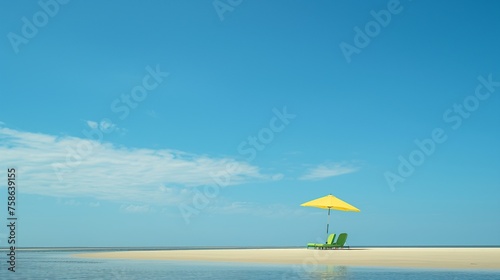 Sandy coast with beach umbrella and lounge chairs. Tropical relaxation spot