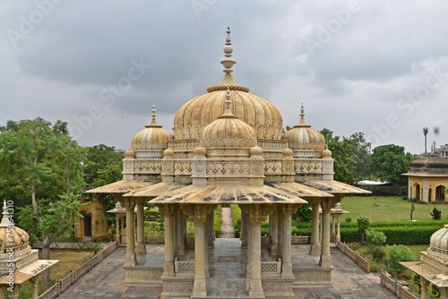 Majestic Royal Cenotaphs Amidst Verdant Greenery Under Cloudy Skies at Maharani Ki Chhatri  Jaipur  Rajasthan  India