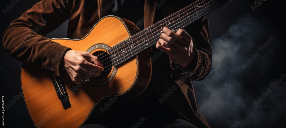 Obraz premium hands on guitar, copy space for text