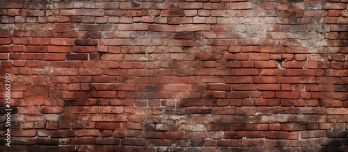 An intricate pattern of brown bricks adorns a closeup view of a brick wall, showcasing the artistic beauty of this building material