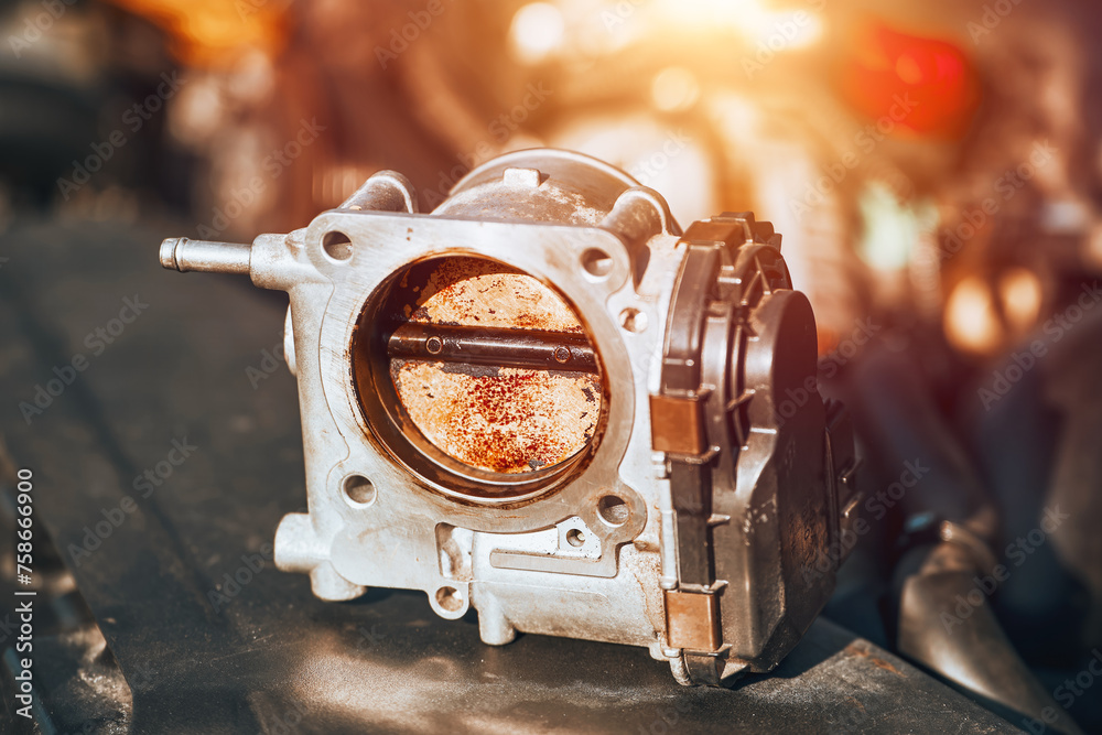 The carbon deposits on the throttle body reduce the air intake and