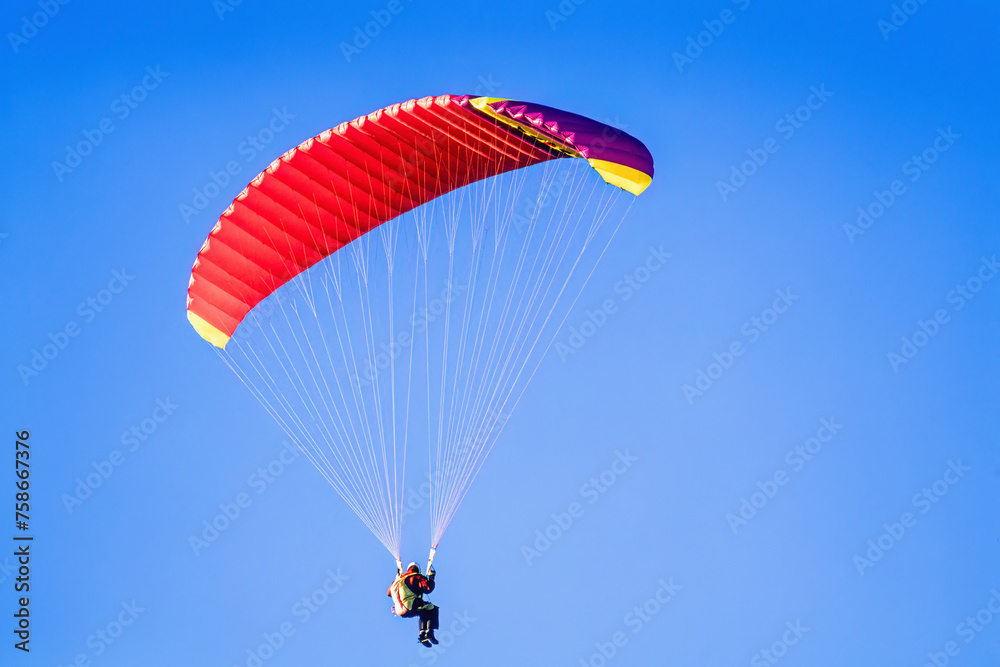 Paraglider on a clear blue summer sky Paraglider on a clear blue summer sky
