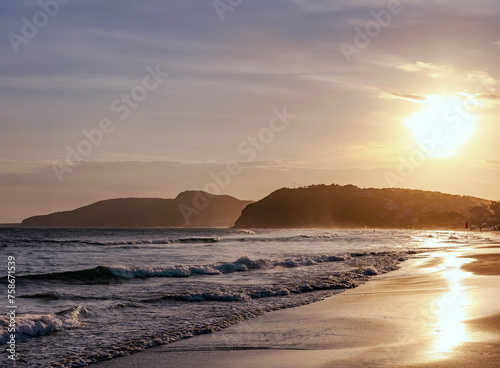 Waves of the Atlantic Ocean at Geriba beach on sunset in Buzios, Rio de Janeiro, Brazil photo