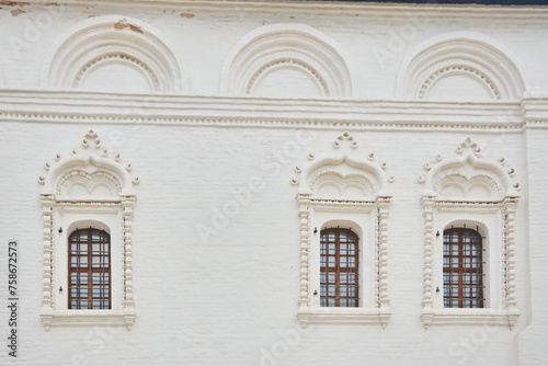 The windows of an ancient building. Vintage Slavic architecture