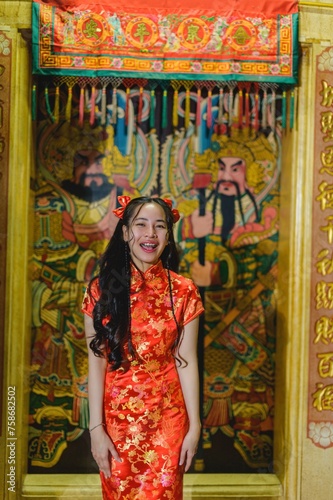 Asian beautiful woman Dress in Chinese style, Chinese New Year festival at night