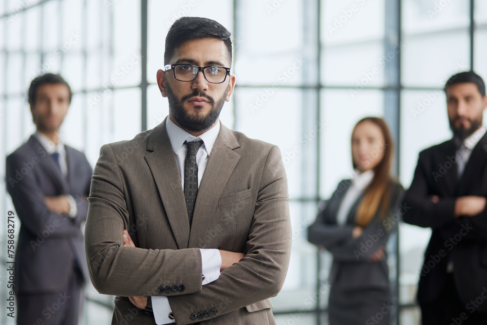 Portrait of successful diverse international business team friendly group of four coworkers Portrait of successful diverse international business team friendly group of four coworkers