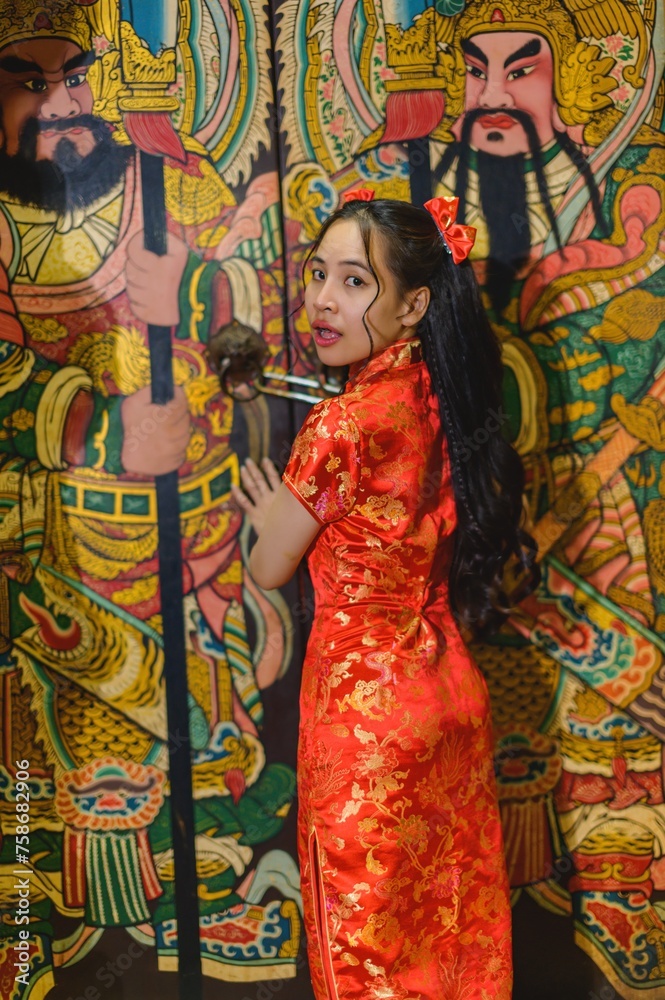Fototapeta premium Asian beautiful woman Dress in Chinese style, Chinese New Year festival at night