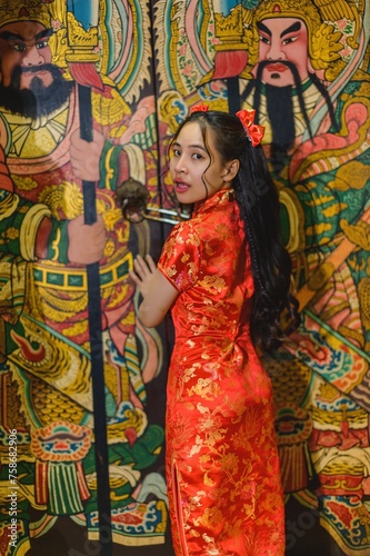Asian beautiful woman Dress in Chinese style, Chinese New Year festival at night