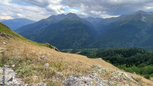 View of the mountain range near Mount Zakan. The top of the mountain node of the western part of the main ridge of the Greater Caucasus. Zakan Peak is the beginning of the Magisho mountain range. 4К photo