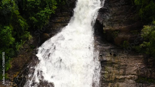 Beautiful waterfall in green forest. Tropical Bopath Falls in mountain jungle, Sri Lanka. photo