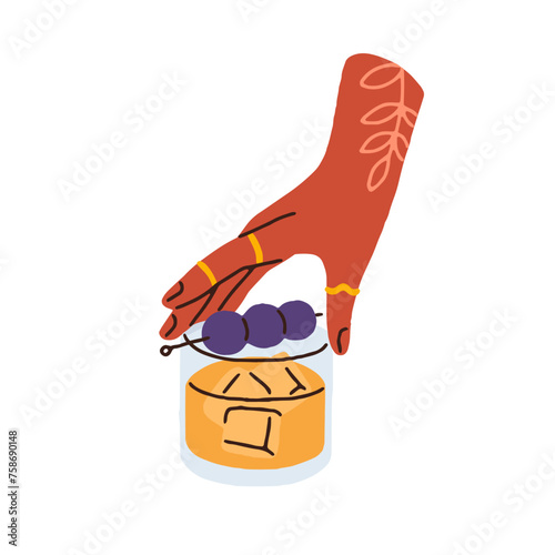 Iced alcohol drink in glass. Hand taking cold whiskey with cherry on stick. P...