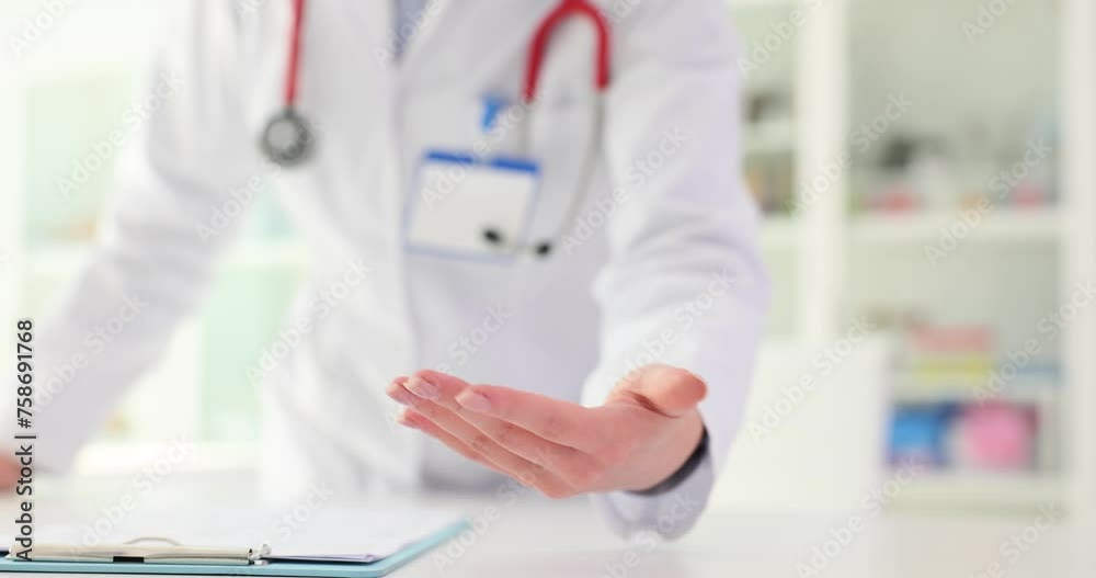 Doctor offers helping hand to patient with serious illness Doctor offers helping hand to patient with serious illness