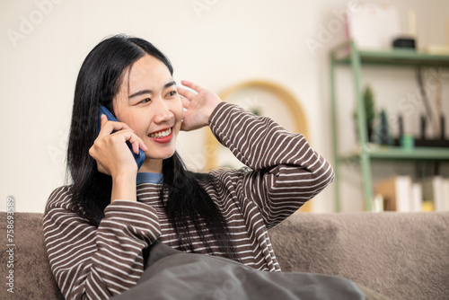 Women doing activities inside the house Communicate via smartphone happily