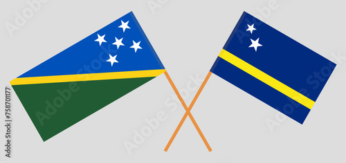 Crossed flags of Solomon Islands and Country of Curacao. Official colors. Correct proportion