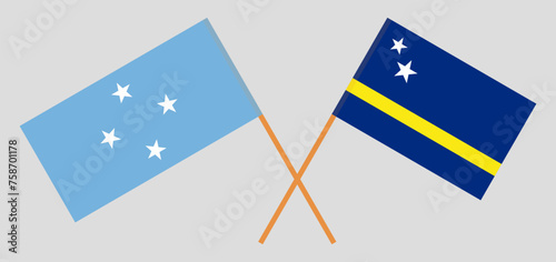 Crossed flags of Micronesia and Country of Curacao. Official colors. Correct proportion