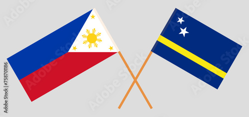 Crossed flags of the Philippines and Country of Curacao. Official colors. Correct proportion