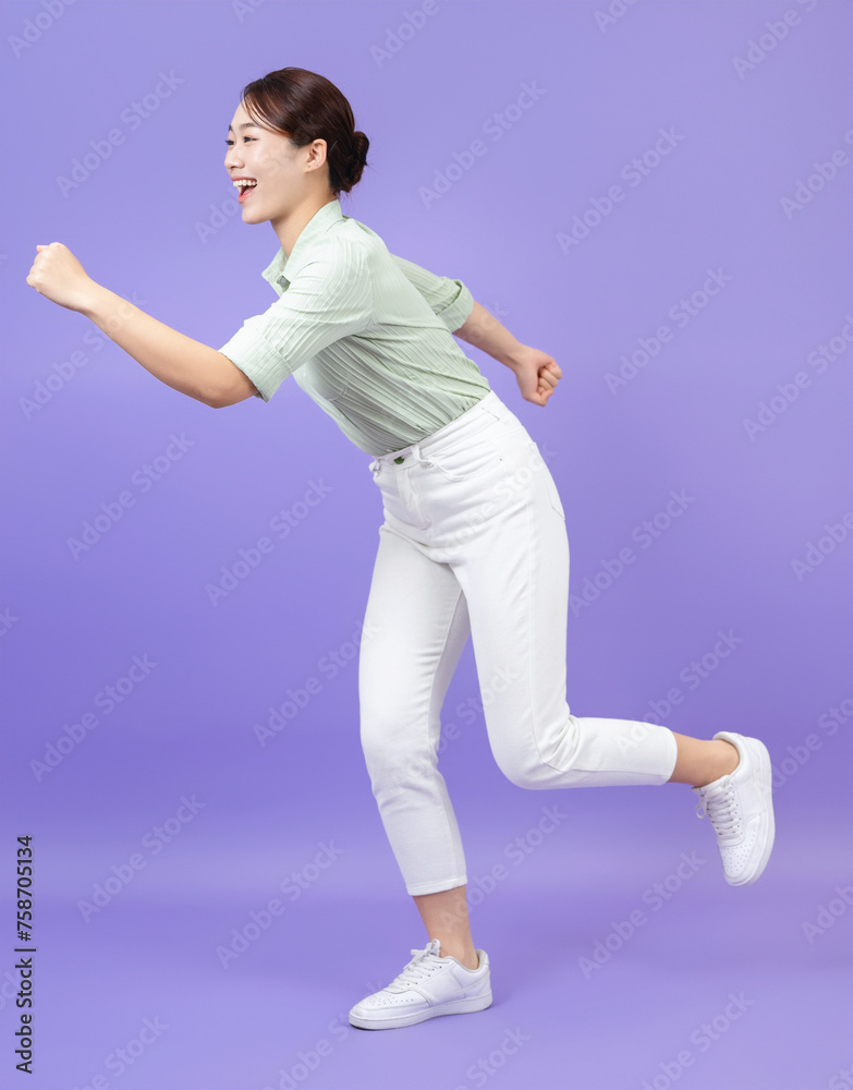 Photo of young Asian woman on purple background