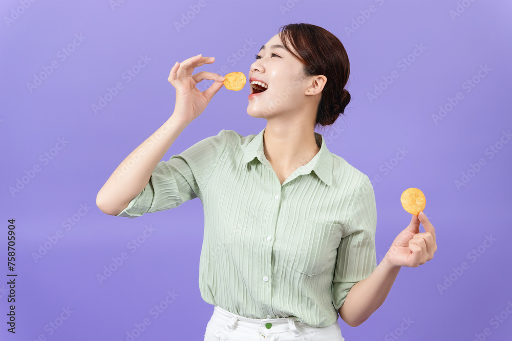 Photo of young Asian woman on purple background Photo of young Asian woman on purple background