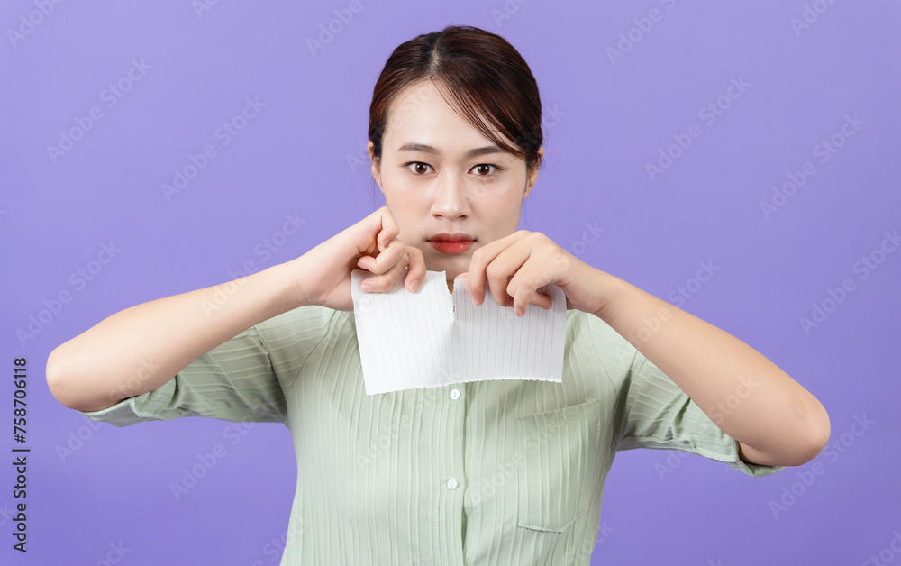 Photo of young Asian woman on purple background Photo of young Asian woman on purple background