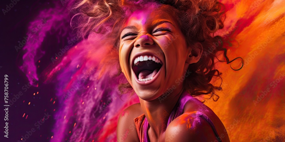 With colors splashed across her face, a woman celebrates Holi with laughter and merriment, embodying the festive spirit of the occasion.