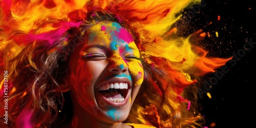 In the midst of Holi celebrations, a woman dances and laughs, her face adorned with the vibrant hues of the festival.