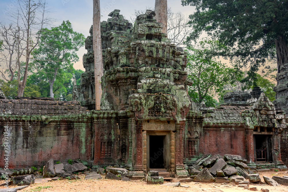 Ancient ruins of the Ta Prohm temple complex in Cambodia. Ancient ruins of the Ta Prohm temple complex in Cambodia.