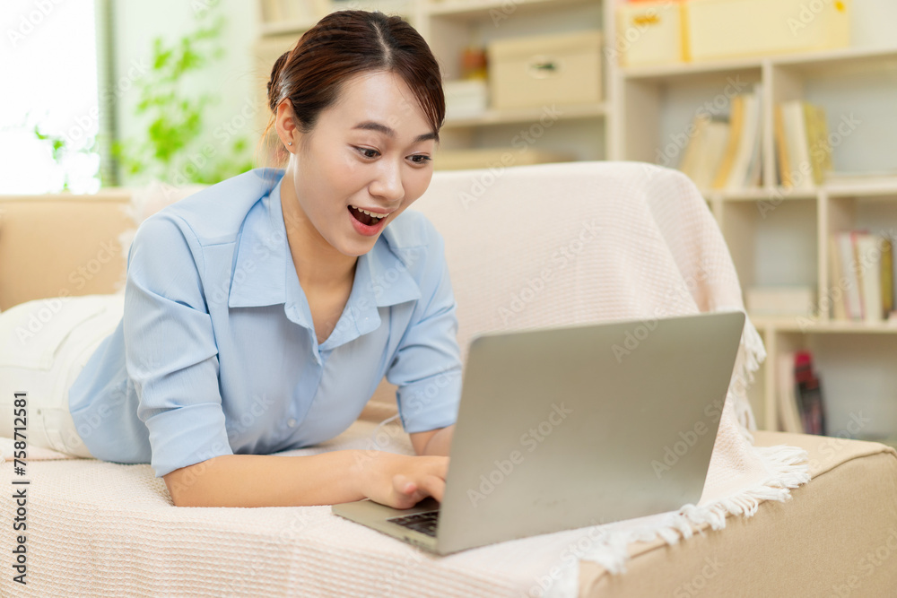 Photo of young Asian woman at home Photo of young Asian woman at home