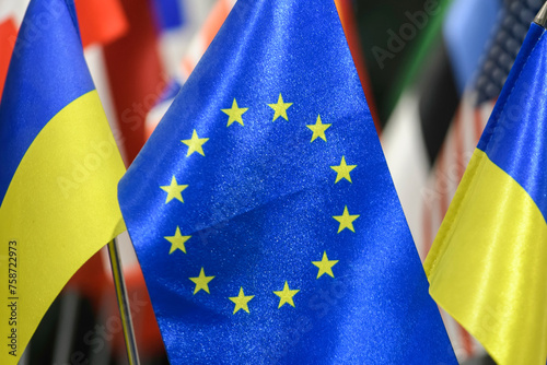The national flag of Ukraine and the flags of the European Union and the another counties flags background