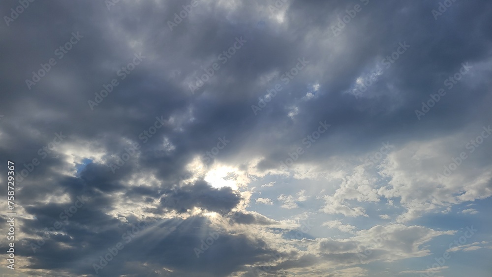 Blue sky with white cloud sun reflection, Cloudy background