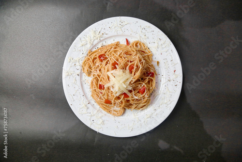 White Plate With Spaghetti and Sauce