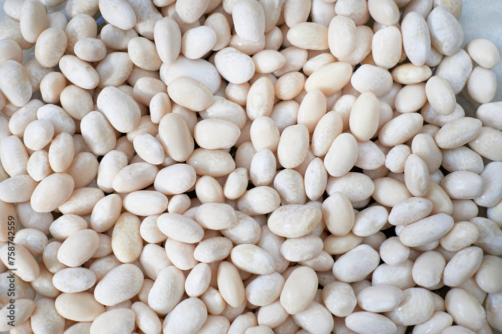 Fresh beans on table background, ready for cooking Fresh beans on table background, ready for cooking