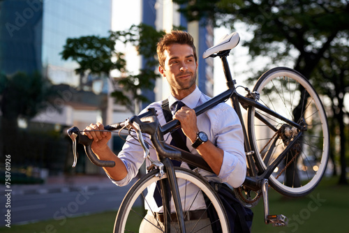 Morning, businessman and bicycle for sustainable travel, transportation and carbon footprint in city. Professional, commute and male employee walking with bike for cycling, journey or eco friendly photo