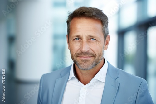 Portrait of a handsome mature man in a business suit. Men s beauty  fashion.