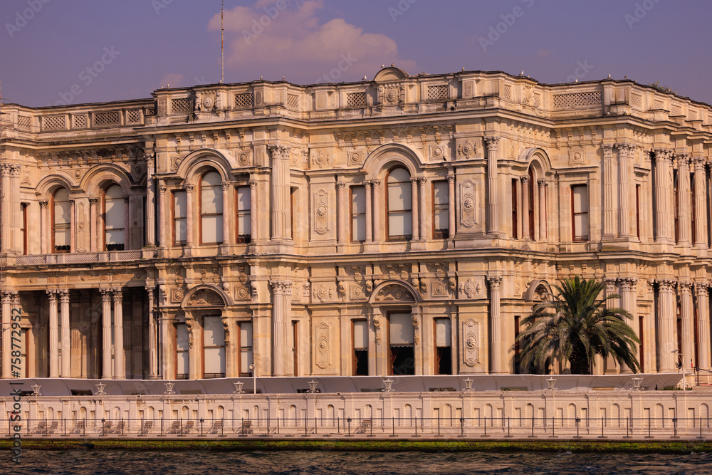 View from the water of the Bosphorus Strait to ancient palaces and buildings. Public place on the street of Istanbul, Türkiye.