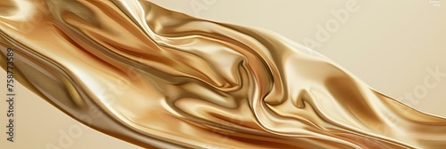 Abstract gold cloth floated on a light beige background photo