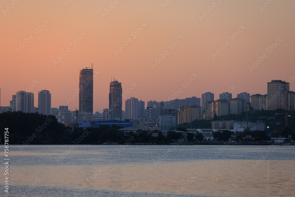 Evening view of the city. Sunset sky and beautiful landscape. Evening view of the city. Sunset sky and beautiful landscape.