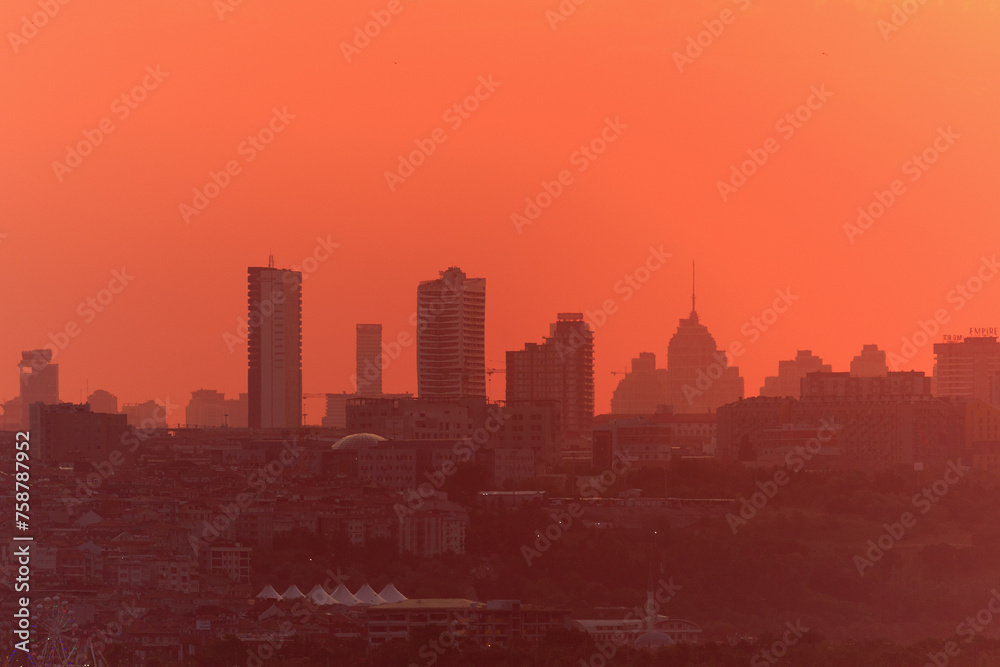 Evening view of the city. Sunset sky and beautiful landscape.
