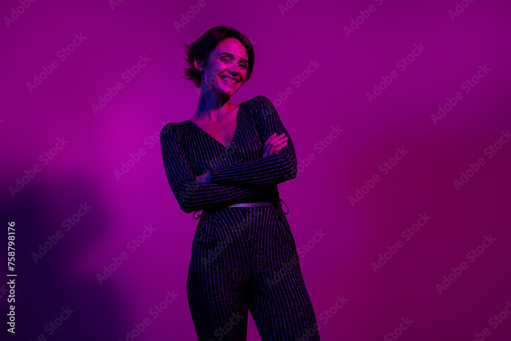 Photo portrait of pretty young girl folded hands confident wear trendy overall outfit isolated on neon light pink color background Photo portrait of pretty young girl folded hands confident wear trendy overall outfit isolated on neon light pink color background