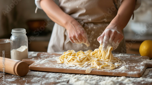 Closeup of process of making cooking homemade pasta. Chef make fresh italian traditional pasta