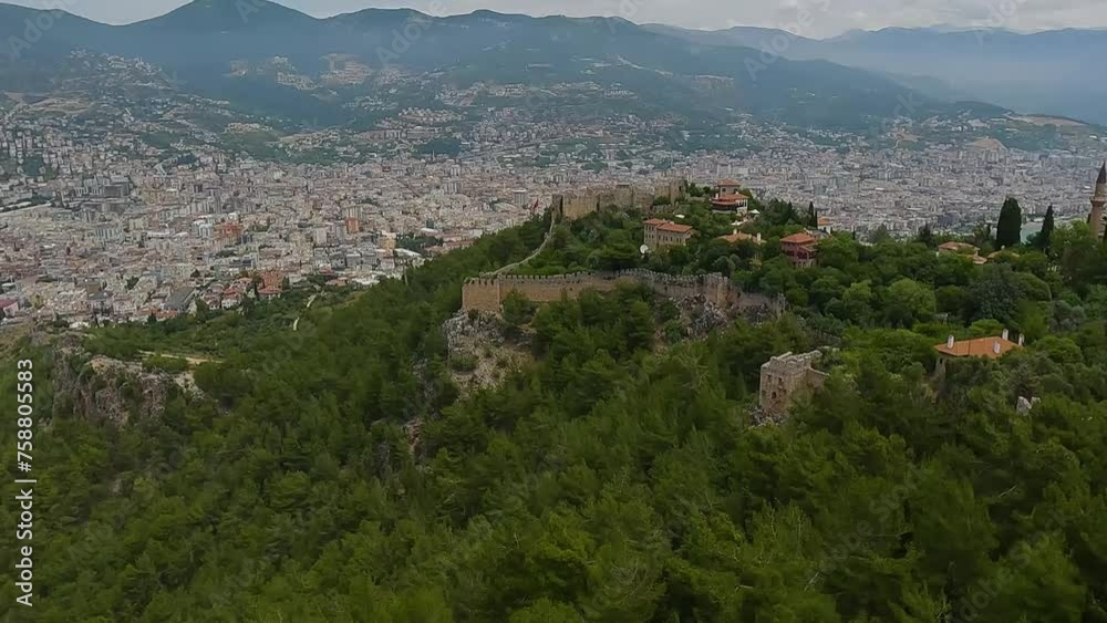 Top view of Turkish cities, view from the mountain to the beach, sea and city