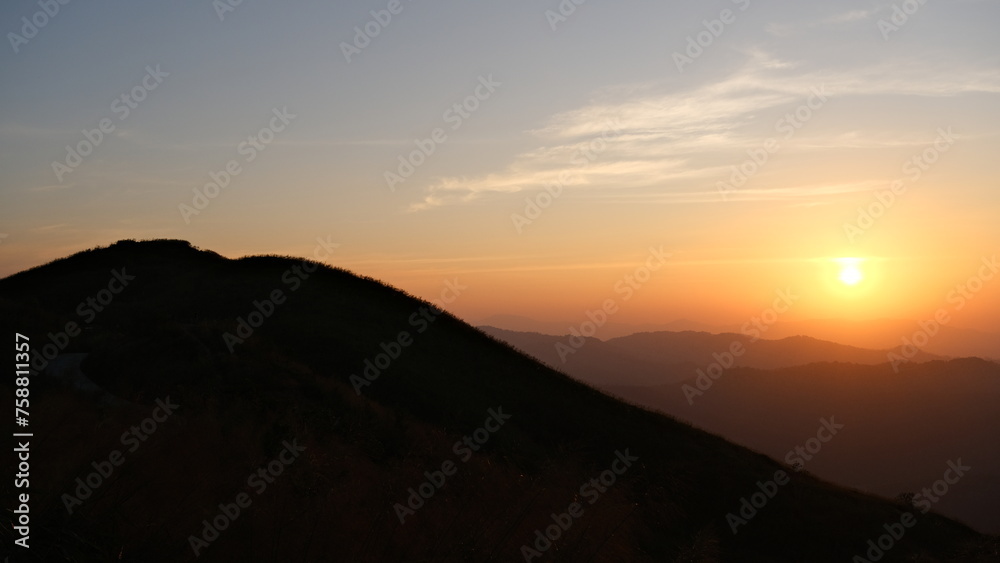 Sunset over the mountains in the evening. Sunset over the mountains in the evening.