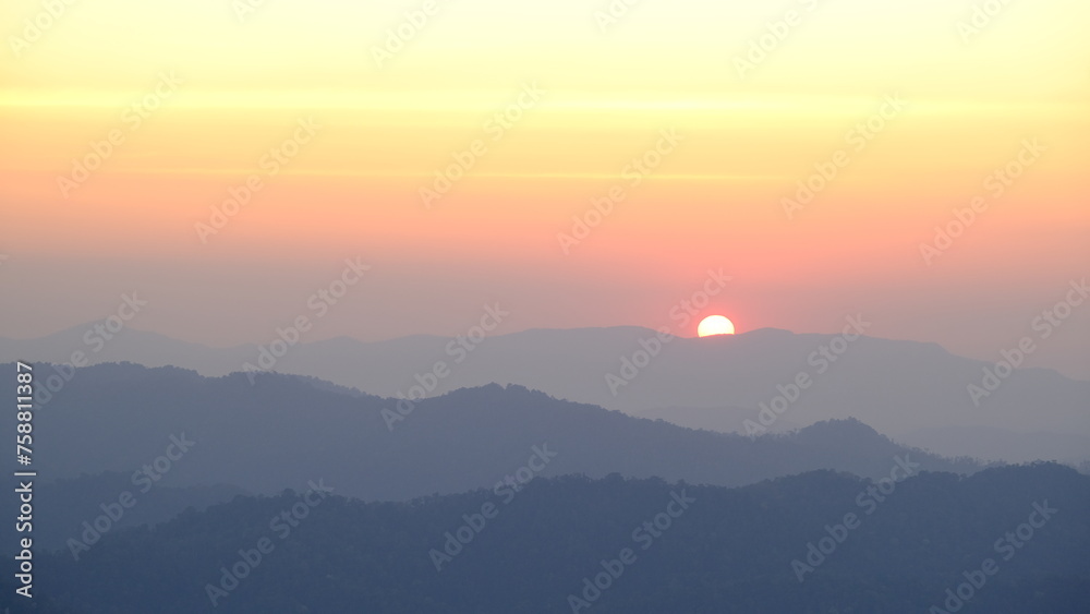 Fototapeta premium Sunset over the mountains in the evening.