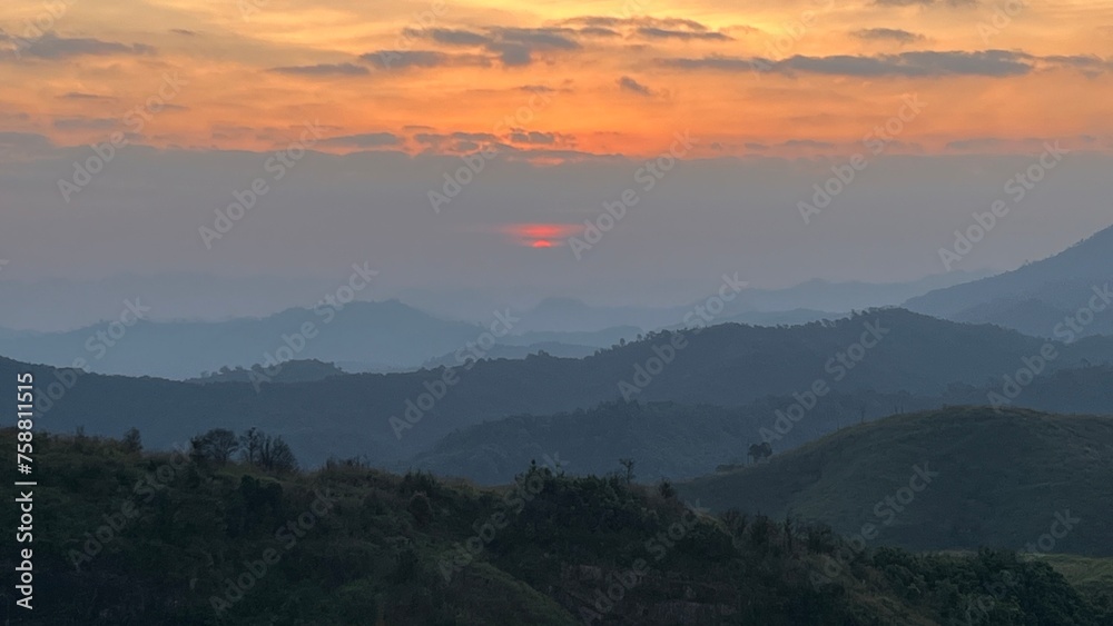 Fototapeta premium Sunset over the mountains in the evening.