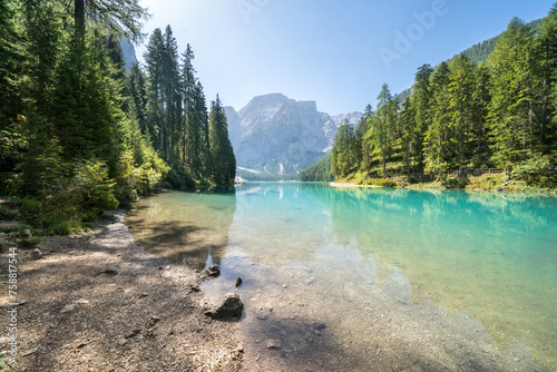 Turquoise lake Braies in the heart of the Dolomites, Italy photo